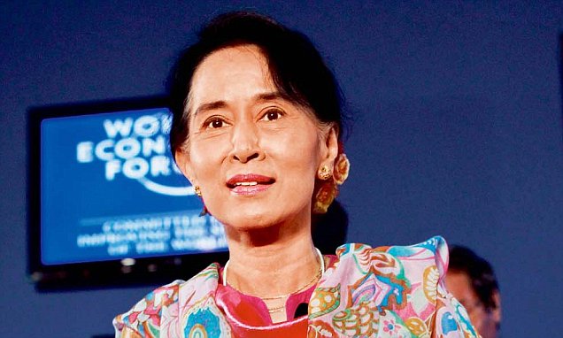 Myanmar's pro-democracy leader Aung San Suu Kyi arrives to BBC World Debate during World Economic Forum on East Asia in Naypyitaw